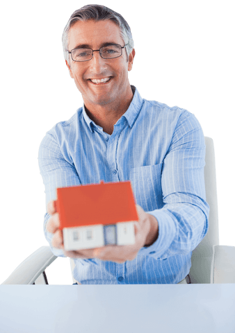smiling businessman holding house model transparent background - Download Free Stock Videos Pikwizard.com