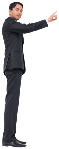 Focused Asian Businessman Pointing Upward with Determination Transparent