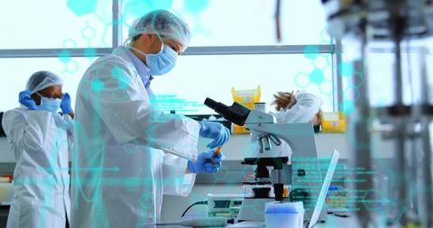 Scientist Working in Laboratory with Advanced Research Equipment