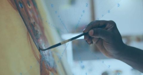 Artist Painting on Canvas with Digital Overlay Symbolizing Innovation