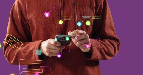 Man Using Smartphone with Social Media Icons Floating