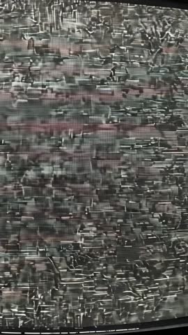 Flickering Curved-Oval CRT Television Displaying Static and Scanlines in Vertical Video