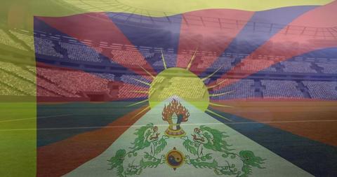 Capturing a digitally generated image of the Tibetan flag overlayed atop the backdrop of a brightly lit sports stadium. This blending of sports and cultural symbolism might be ideal for use in content associated with sporting events celebrating diversity, cultural heritage events, or motivation and unity themes. The visual focus is equally divided between the dynamic symbolization of the flag and the excitement of a stadium, making it versatile and inspiring for promotional and educational materials.