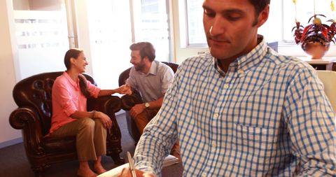 Happy Couple Visiting Therapist for Counseling Session