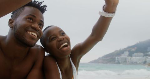Happy Couple Taking Selfie on Beach Day Out
