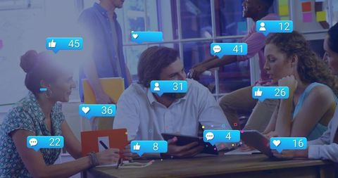 Team collaboration in modern workplace with digital engagement icons