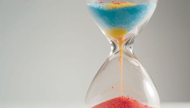 Colorful Sand Hourglass Symbolizing Time and Precision in Studio