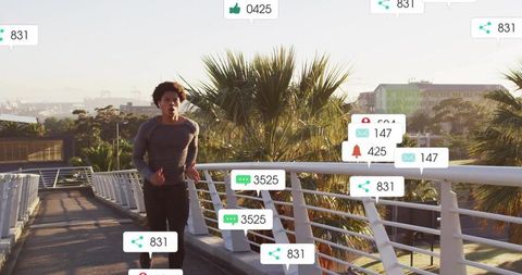 Active Male Jogger with Floating Social Media Icons on Urban Bridge