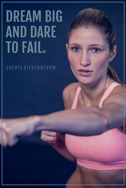 This motivational poster features a determined female athlete in a pink sports bra, with a powerful quote encouraging viewers to dream big and dare to fail. Perfect for gyms, sports clubs, and fitness centers, this image can also be used in motivational presentations and social media posts to inspire and empower.