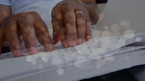 Hands Reading Braille with Dynamic Light Spots