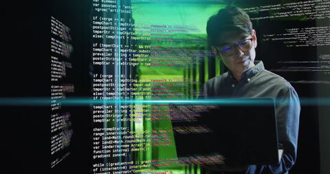 programmer analyzing code in high-tech server room - Download Free Stock Images Pikwizard.com