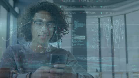 Young Man Analyzing Financial Data Digitally