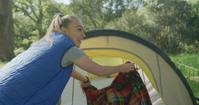 Smiling Woman Enjoying Camping in Green Forest - Download Free Stock Images Pikwizard.com