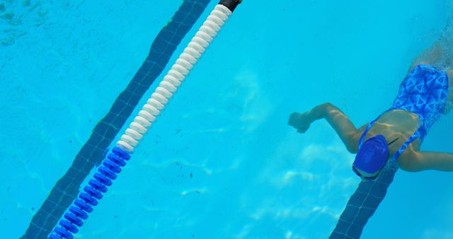 Professional Swimmer in Action in Pool - Download Free Stock Images Pikwizard.com