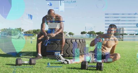 Two athletes resting and hydrating after outdoor tire and dumbbell workout with digital hud
