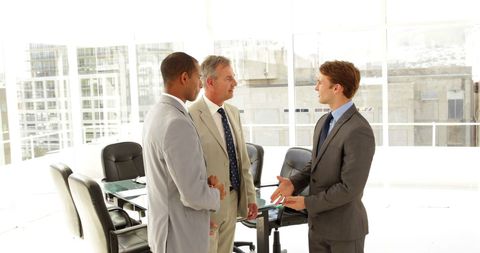 Businessmen Introductions at Modern Office Meeting - Download Free Stock Images Pikwizard.com