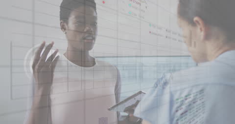 Diverse Female Team Collaborating on Data Analytics