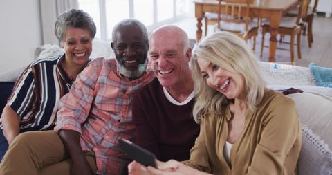Joyful Seniors Taking Selfie Indoors with Digital Icons - Download Free Stock Images Pikwizard.com