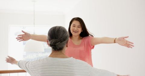 Smiling Family Embrace in Bright Home Interior