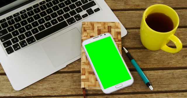 Laptop, Smartphone with Green Screen, Notebook and Coffee - Download Free Stock Images Pikwizard.com