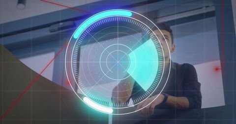 Technician operating holographic interface in control room