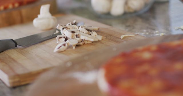 Preparing Fresh Mushrooms for Homemade Pizza Toppings - Download Free Stock Images Pikwizard.com