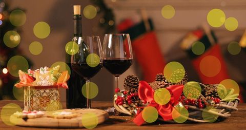 Christmas Celebration with Wine and Festive Decorations - Download Free Stock Images Pikwizard.com