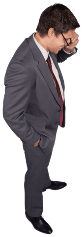 Transparent thinking businessman touching glasses in formal suit