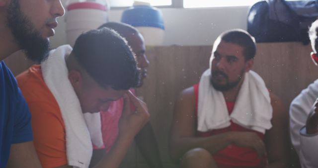 Team Sports Players Resting in Locker Room with Towels - Download Free Stock Images Pikwizard.com