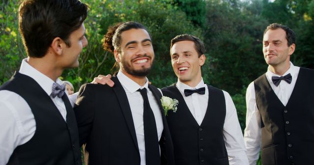 Happy Groomsmen Celebrating Outdoors Wearing Formal Suits - Download Free Stock Images Pikwizard.com