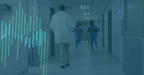 Doctor Leading Nurses Running Down Hospital Corridor Responding to Urgent Emergency