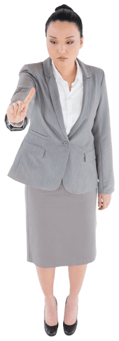 Asian businesswoman pointing for leadership or directing concept