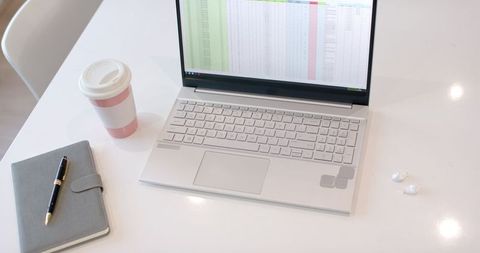 Organized Workspace Featuring Laptop with Spreadsheet and Coffee - Download Free Stock Images Pikwizard.com