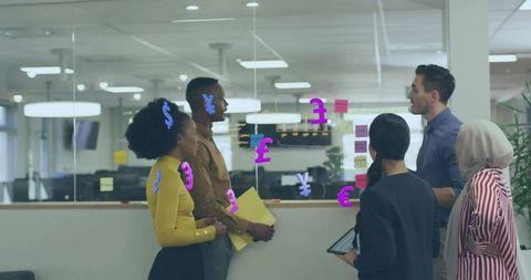 Diverse business team brainstorming finance strategy at glass wall with currency icons