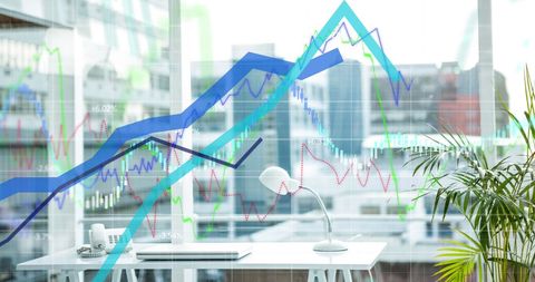 Growing financial graphs overlapping modern office interior