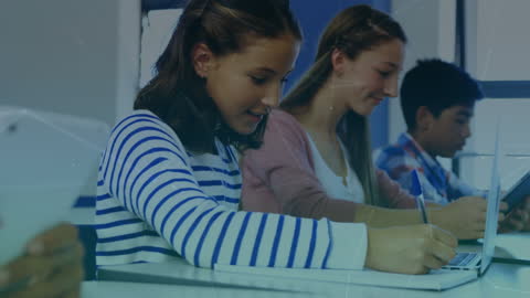 Students Engaged with Interactive Learning Technology in Classroom