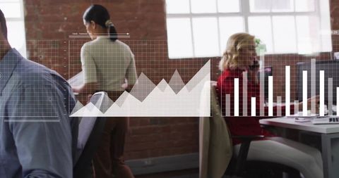 Modern Office with Business Professionals Analyzing Data Charts