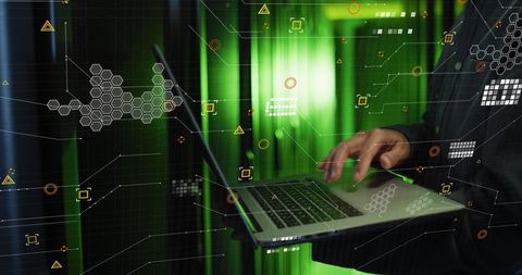 IT Engineer Analyzing Data on Laptop in Server Room - Download Free Stock Images Pikwizard.com