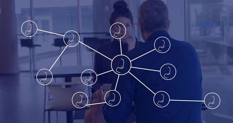 Executives discussing strategy with network overlay symbolizing collaboration and teamwork