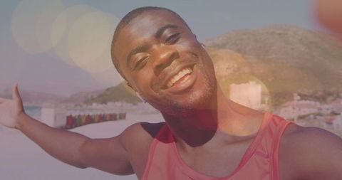Joyful African American Man Smiling at Sunny Beach