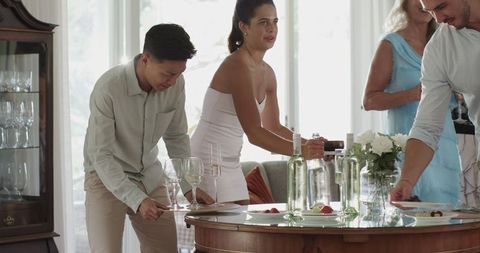 Arranging Elegant Table for Stylish Wedding Celebration