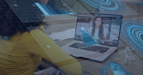 Woman conducting digital meeting from home office with analytics overlay