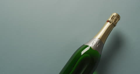 Close-Up of Champagne Bottle on Gray Background