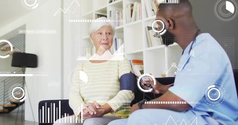 Home health nurse checking blood pressure and monitoring vitals during senior care visit
