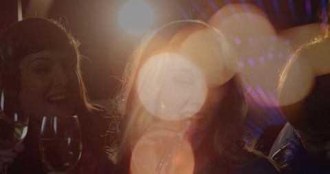 Friends Celebrating at Party with Sparklers