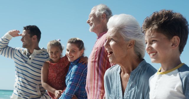 Smiling Multi-Generational Family Enjoying Day at Beach - Download Free Stock Images Pikwizard.com