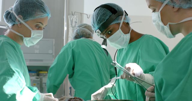 Team of Surgeons Conducting Surgery in Operating Room - Download Free Stock Images Pikwizard.com