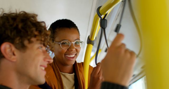 Young friends enjoying bus ride, interacting and smiling - Download Free Stock Images Pikwizard.com