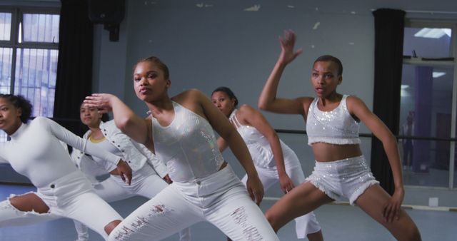 Energetic Young Dance Group Rehearsing in Studio - Download Free Stock Images Pikwizard.com