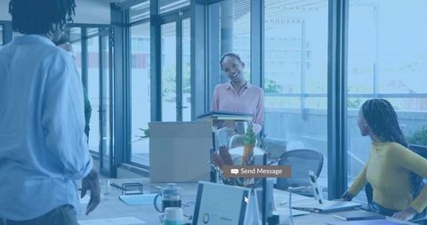 Presenting Folders to Team in Modern Office During Move and Onboarding